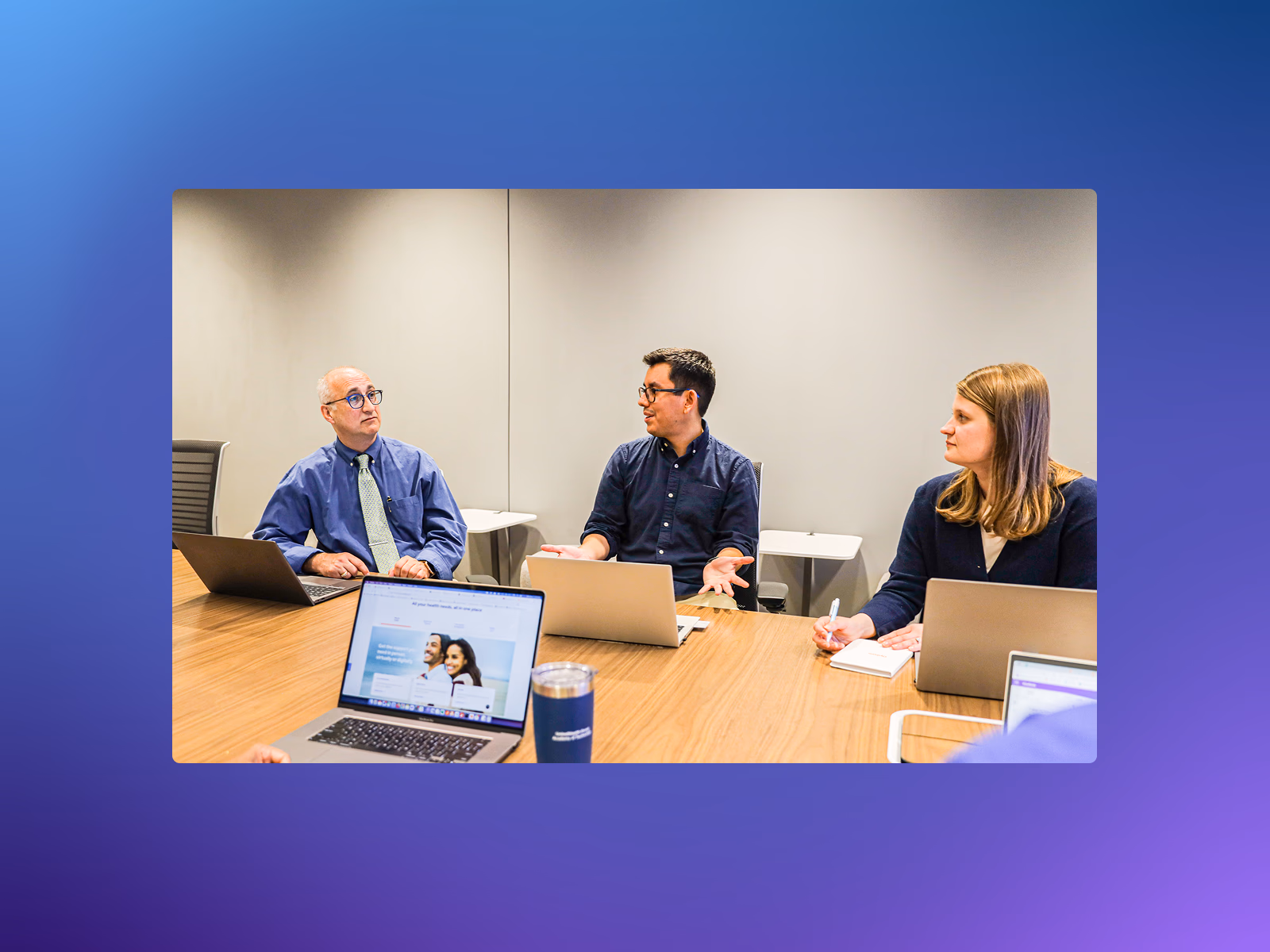Task-based testing session with UHG stakeholders around a conference table